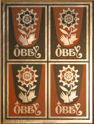 File:Rise Above Stamp on Metal.jpg